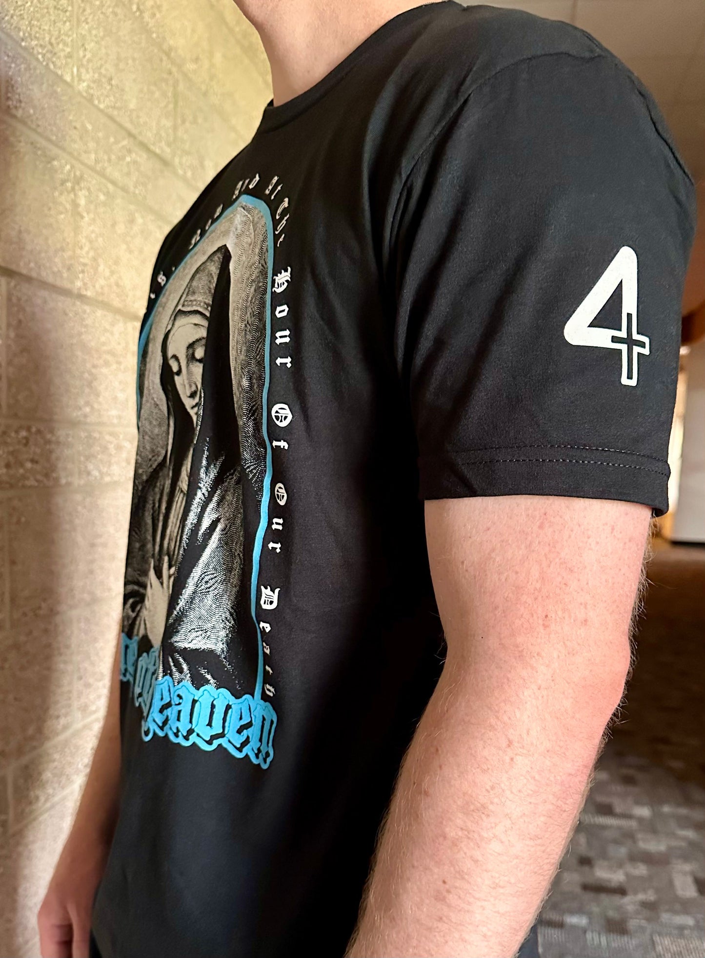 Mary, Queen of Heaven t-shirt on black tee in the catholic church.